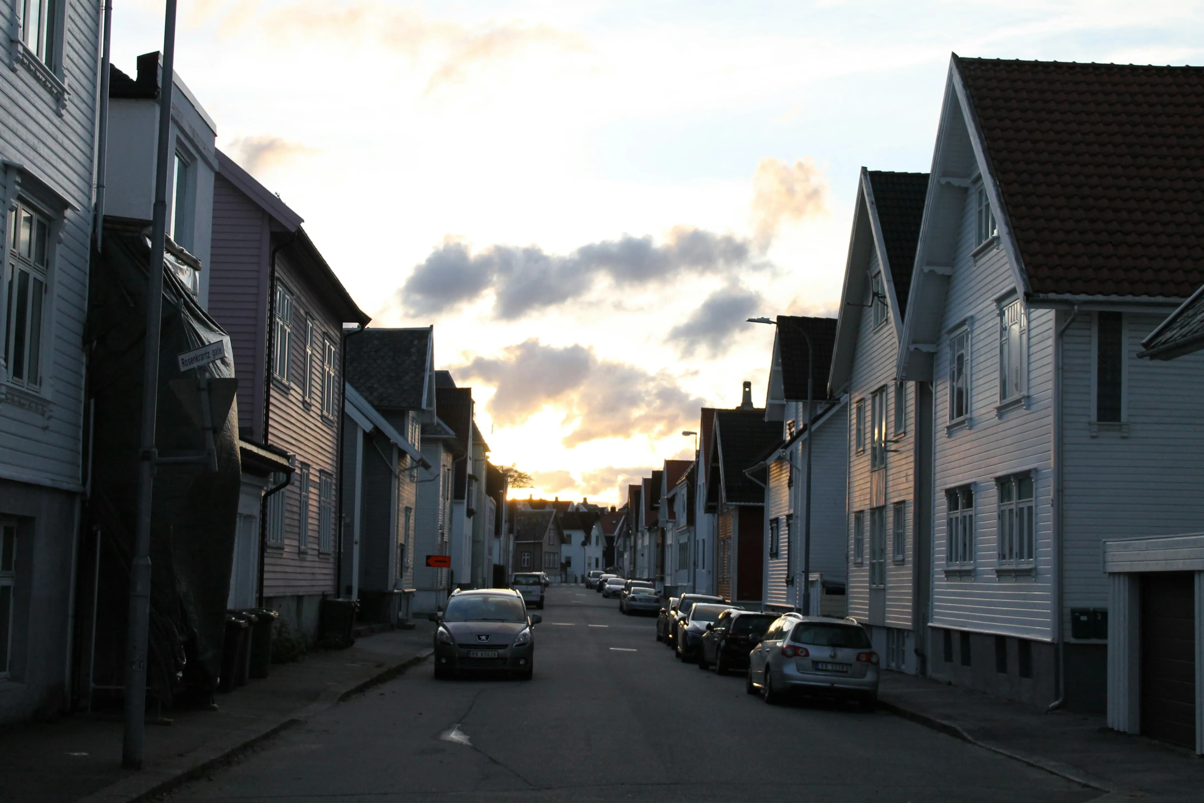 Street lined with houses at dusk