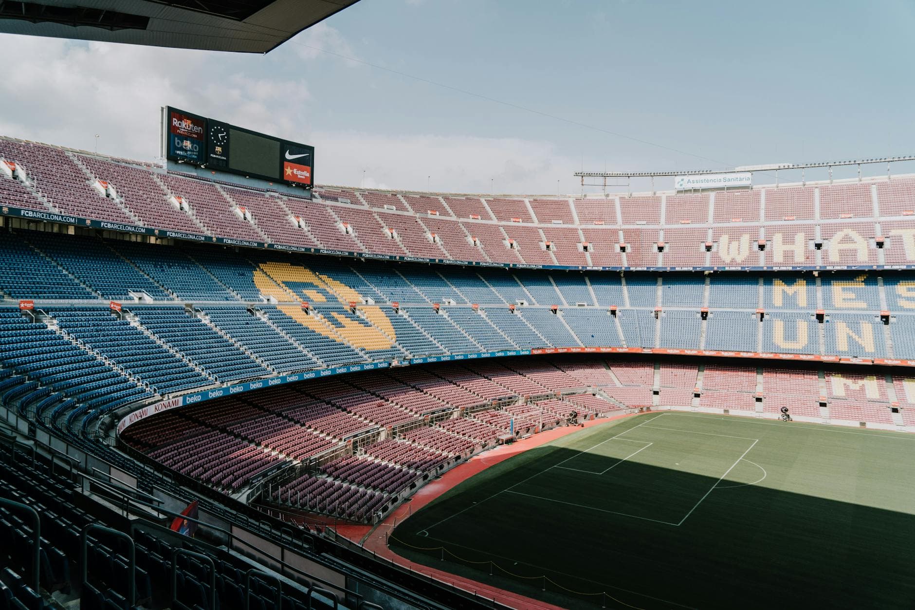 View of Camp Nou stadium in Barcelona, showcasing the iconic stands and field.